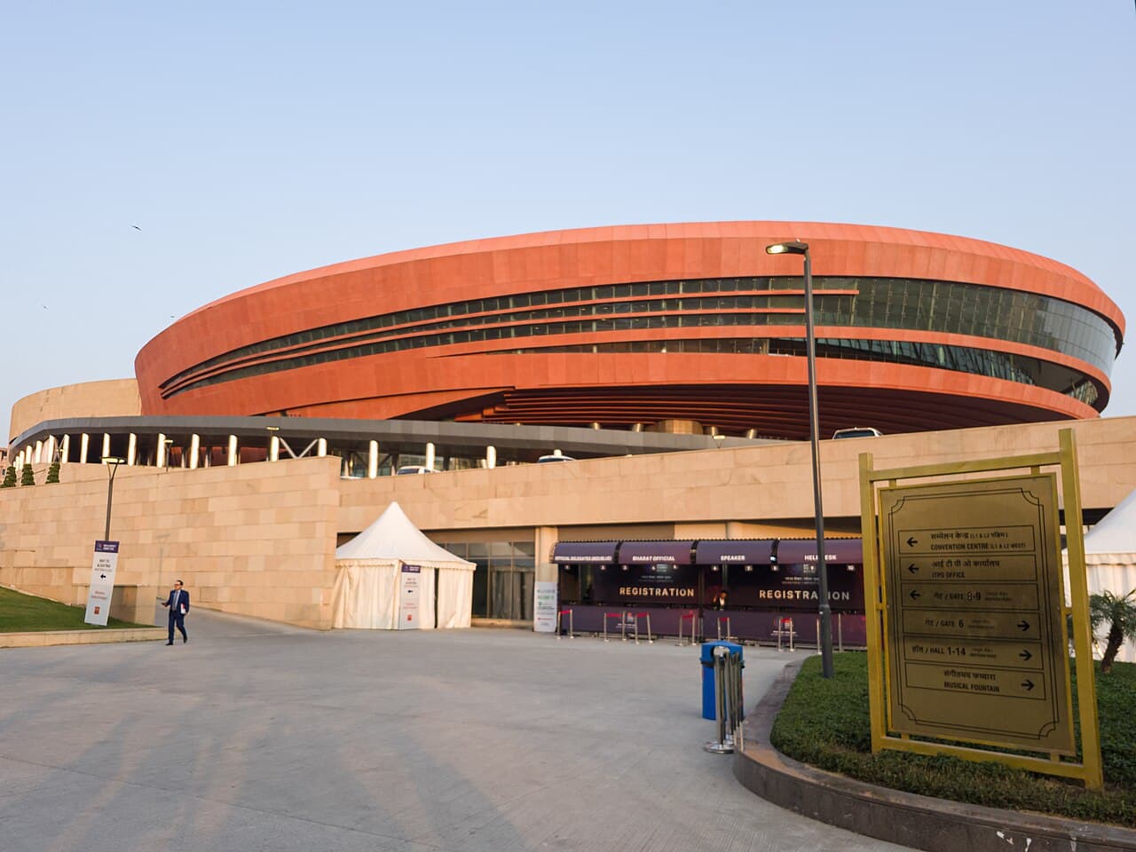 The terracotta-clad drum of Bharat Mandapam rising above the Pragati Maidan forecourt
