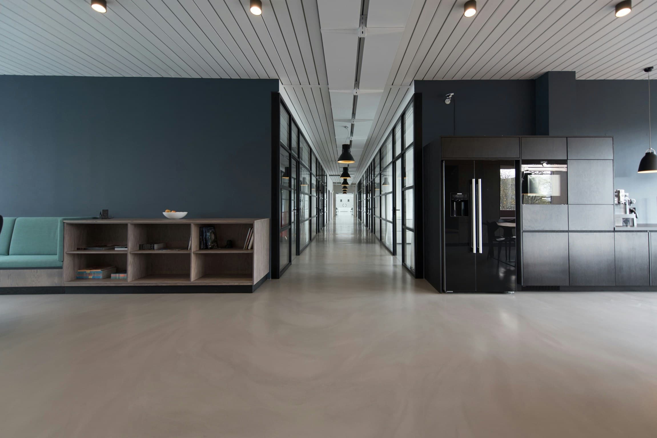 A bright, empty modern hall with clean architectural lines